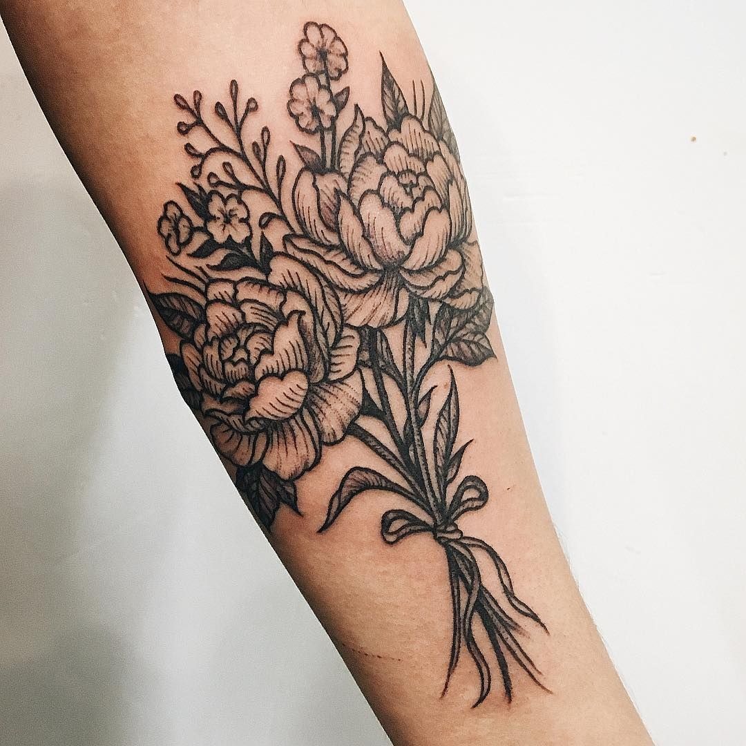 Blackwork Peony Bouquet With a Quiet Traditional Mood, a tattoo design rendered in clean detailed linework for the leg.