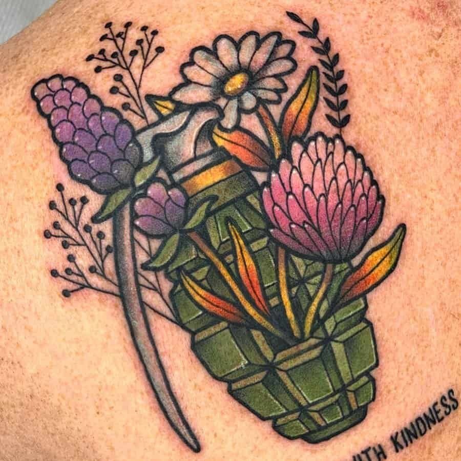Floral Grenade Bouquet for the Bold Hearts, a tattoo design rendered in clean detailed linework.