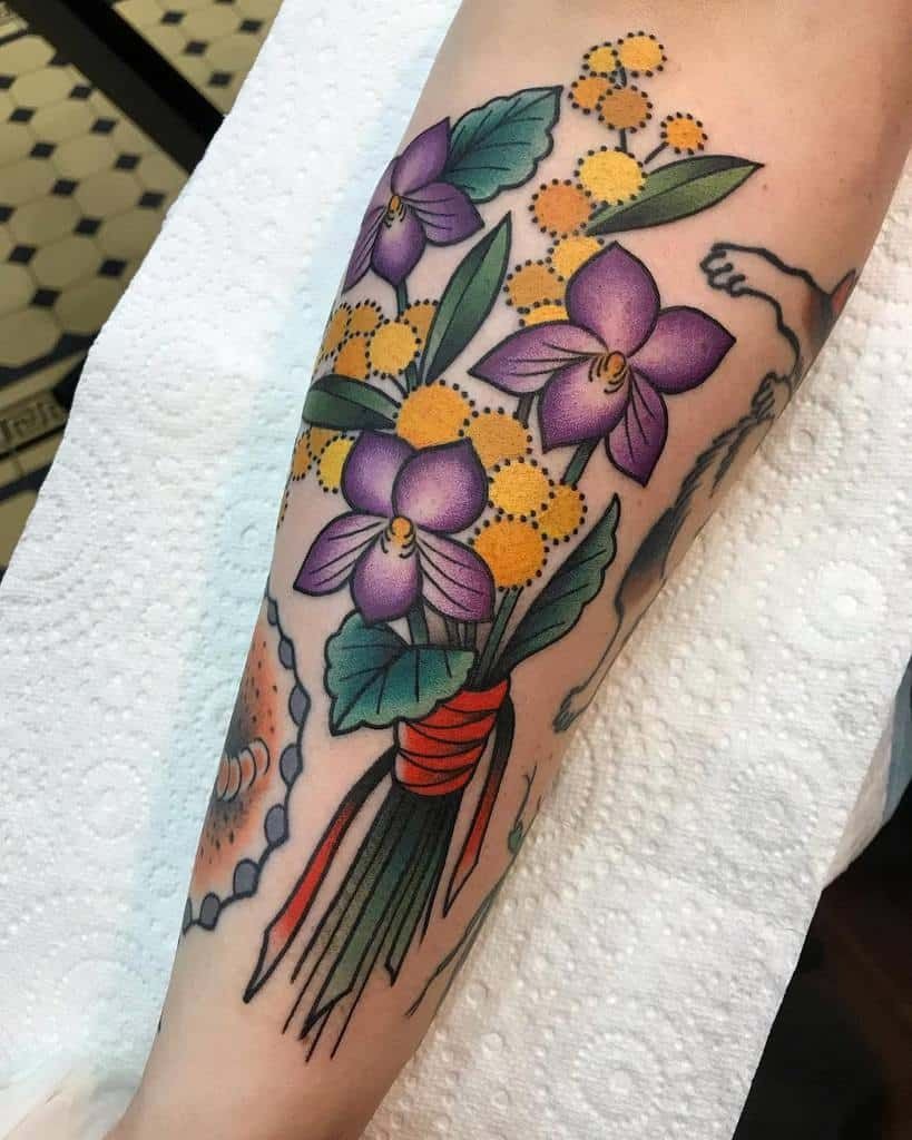 Orchid Bouquet With Bold Ribbon, Big Personality, a tattoo design rendered in clean detailed linework.