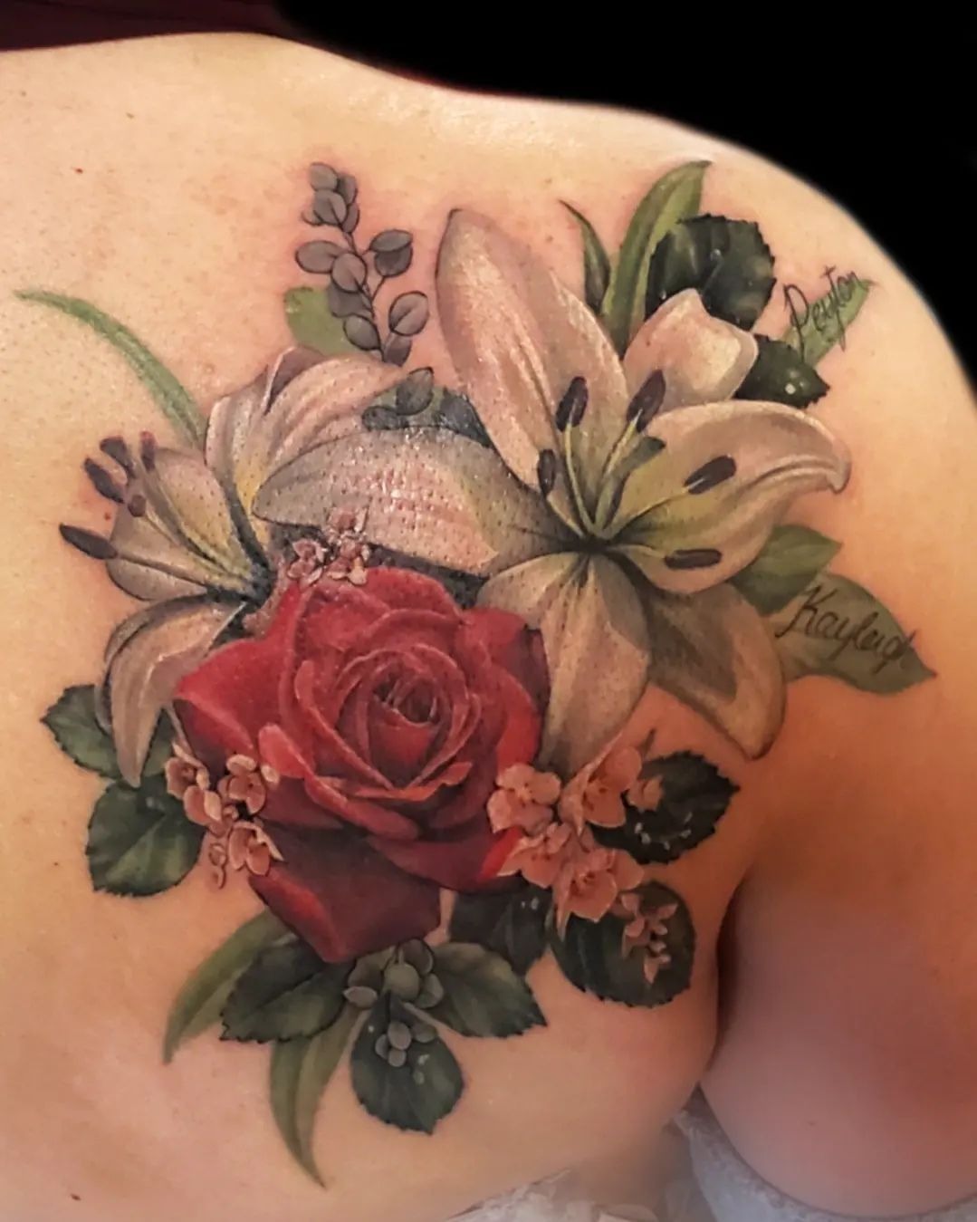 Realistic Rose-and-Lily Bouquet With Names for Family Meaning, a tattoo design rendered in clean detailed linework for the leg.
