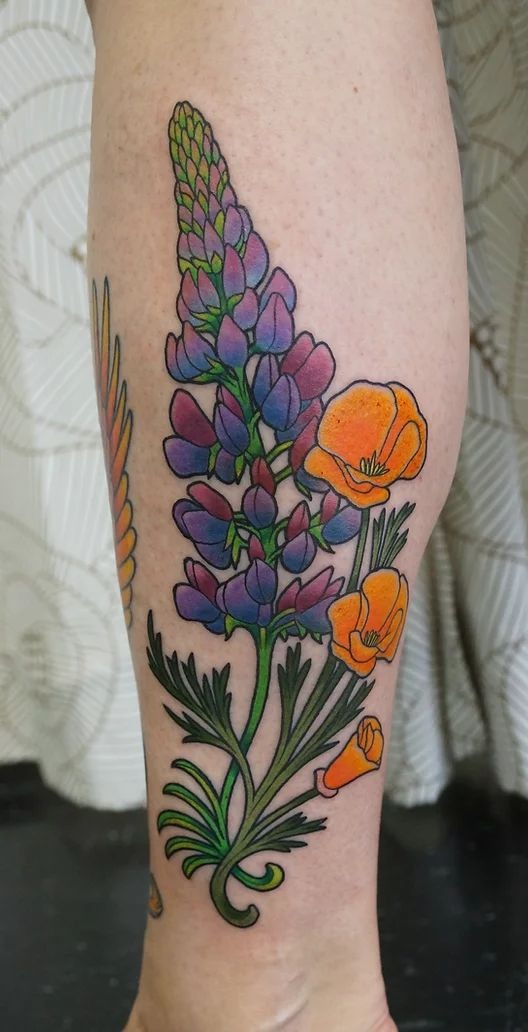 Wild Lupine and Poppy Mix for a Sunny Statement, a tattoo design rendered in clean detailed linework for the arm.