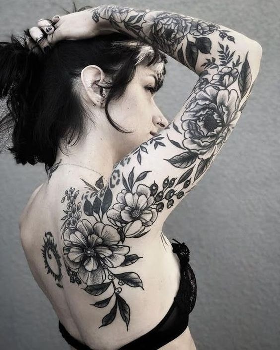 Black and White Peony Negative Space Sleeve Tattoo Design