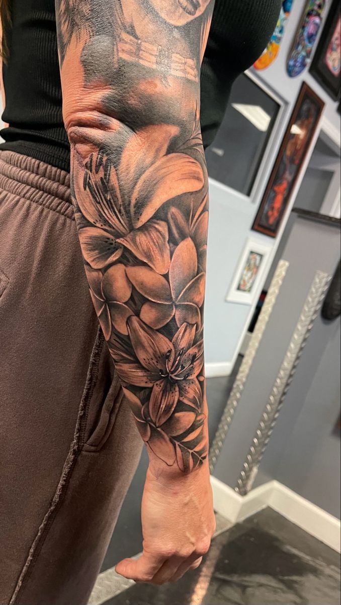 Elegant Rose Women's Floral Sleeve Tattoo Design