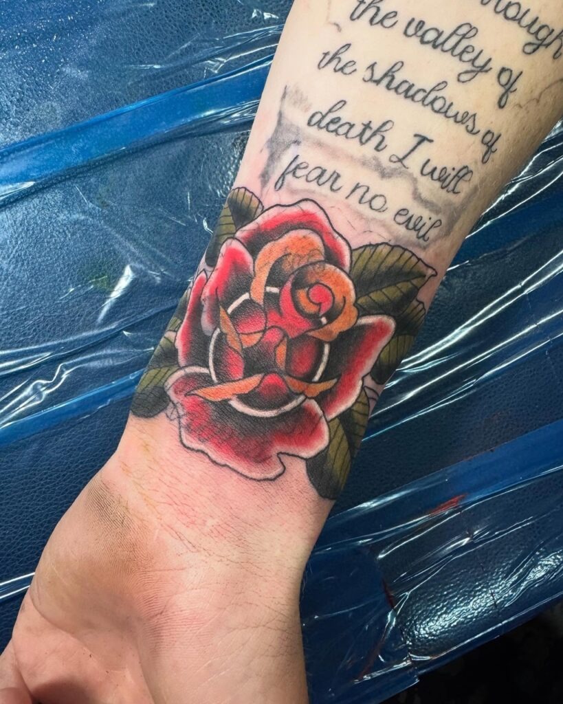 Bold Rose and Scripture Wrist Tattoo Tattoo Design