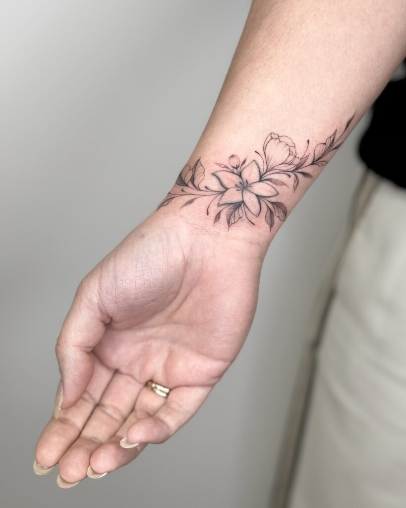 Floral Wraparound Wrist Tattoo Tattoo Design