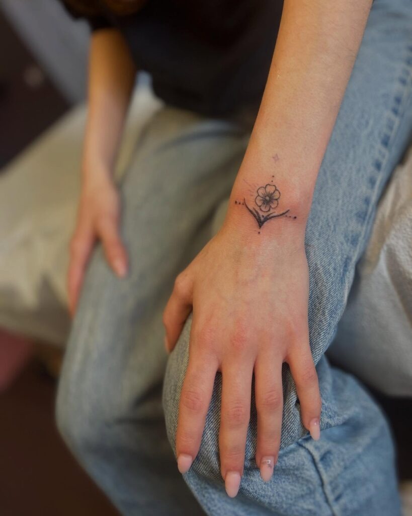 Minimal Floral and Dotwork Wrist Tattoo Tattoo Design
