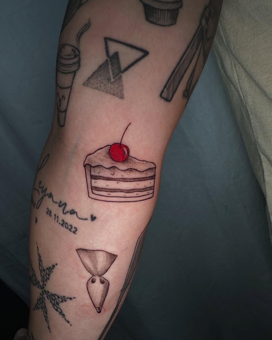 Delicious cake tattoo with cherry on top Tattoo Design