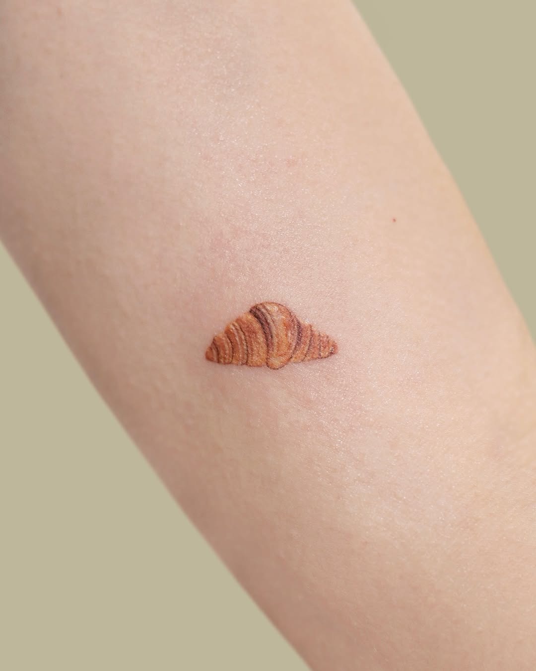 Delicious croissant tattoo with intricate detail Tattoo Design