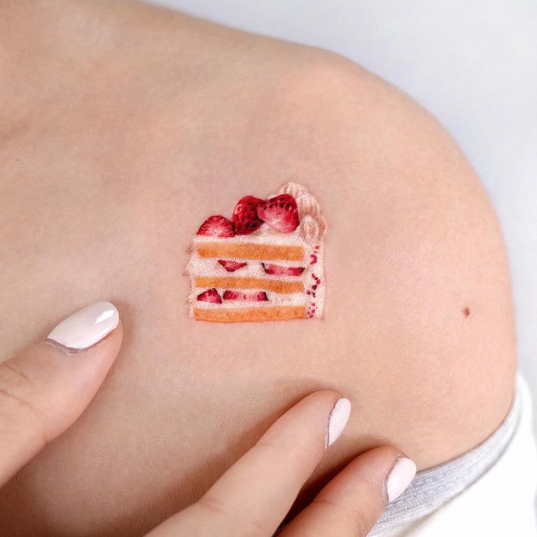 Delicious strawberry cake tattoo captures culinary passion Tattoo Design