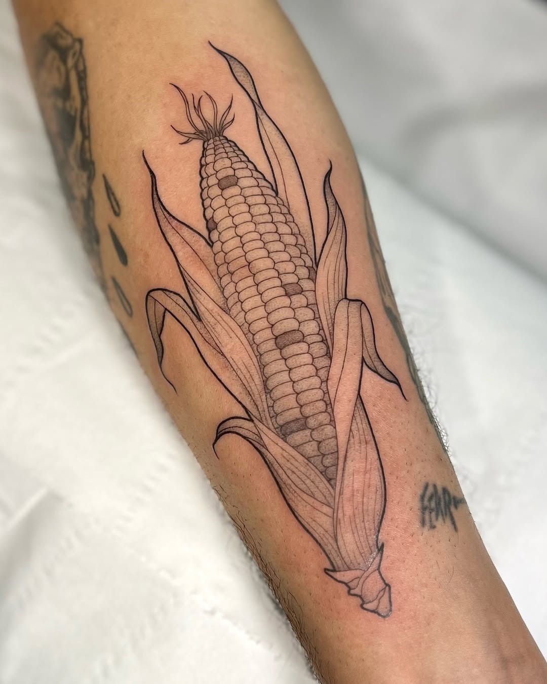 Elegant corn tattoo with intricate detailing Tattoo Design