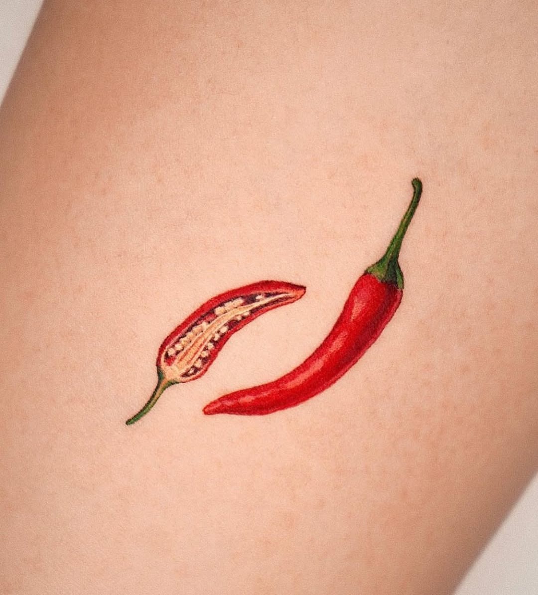 Vibrant chili pepper culinary ink design Tattoo Design