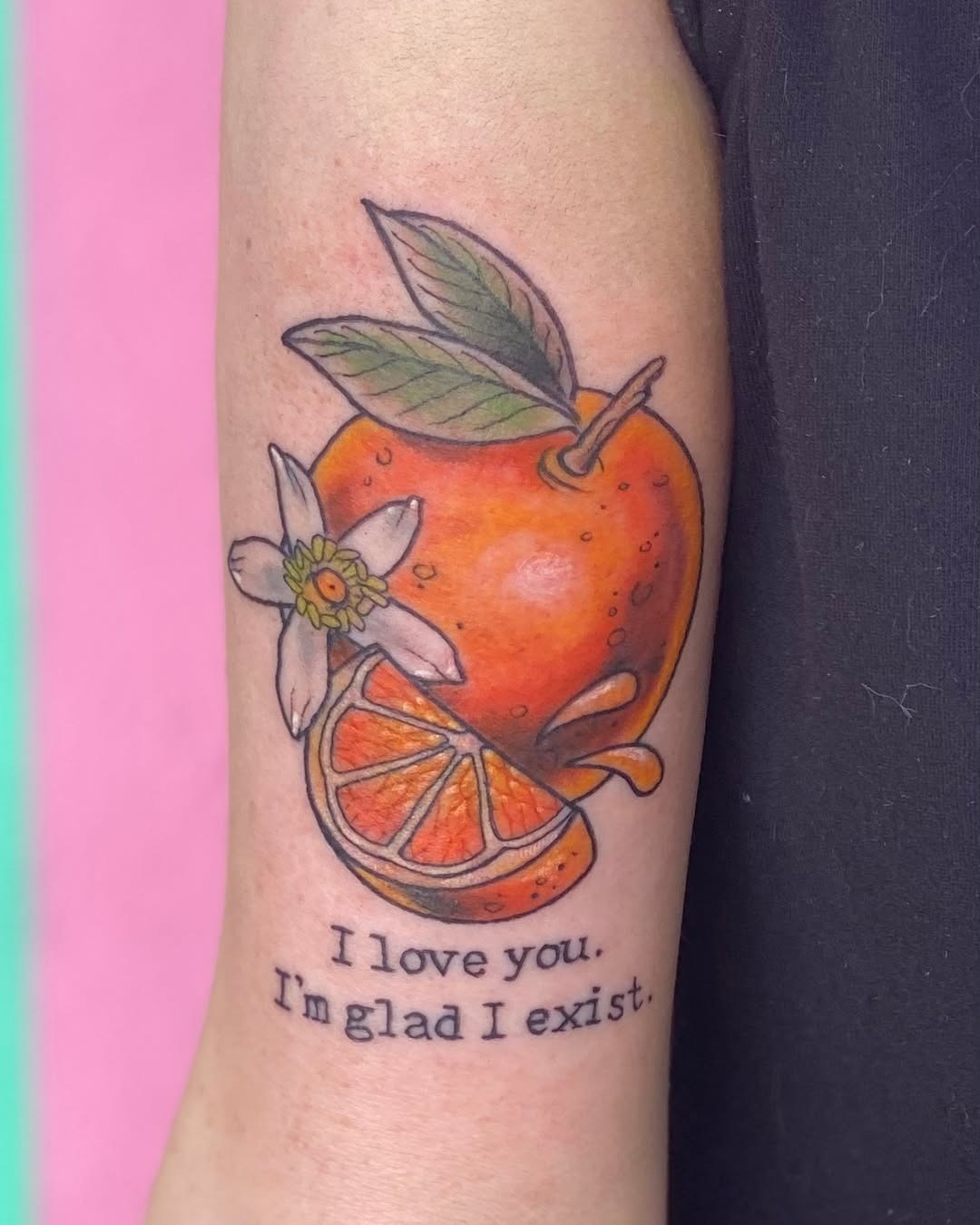 Vibrant orange tattoo with a heartfelt message Tattoo Design