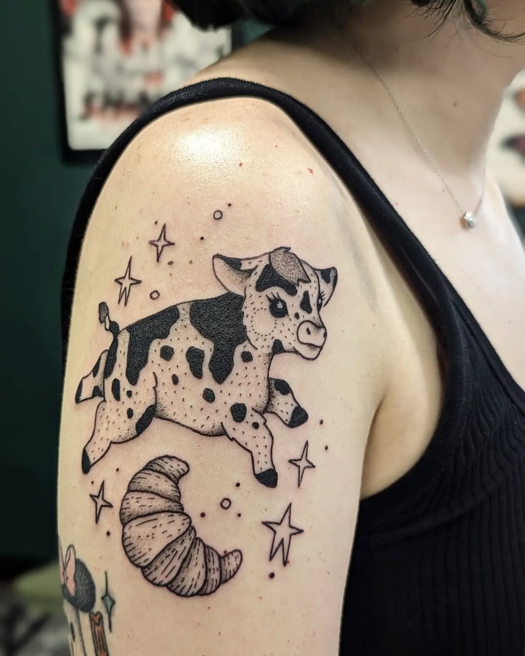 Whimsical cow and croissant culinary tattoo Tattoo Design