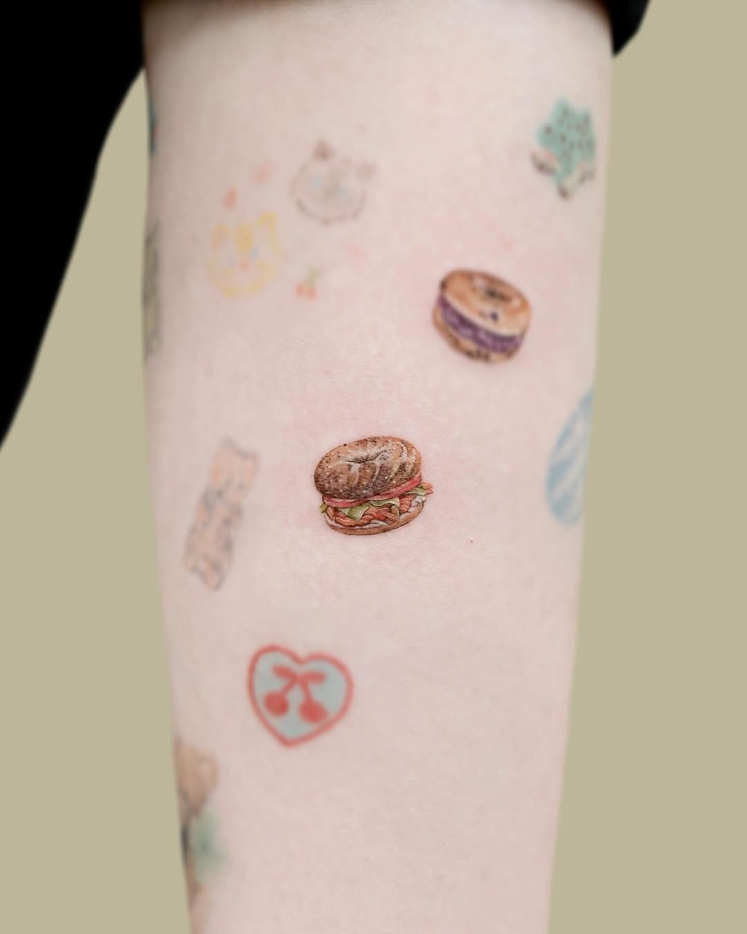 Whimsical edible-themed body art on display Tattoo Design