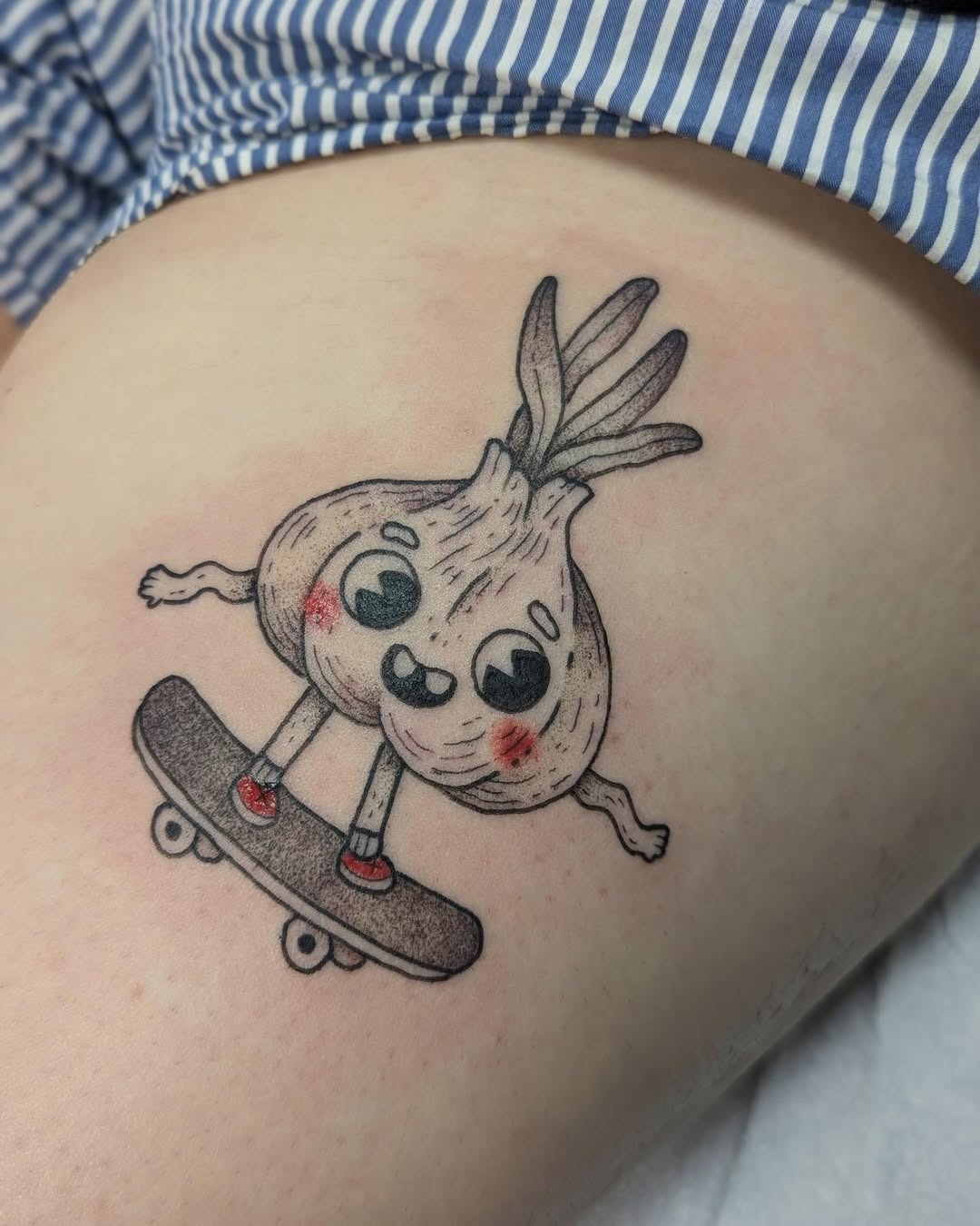 Whimsical Skateboarding Garlic Tattoo Design Tattoo Design