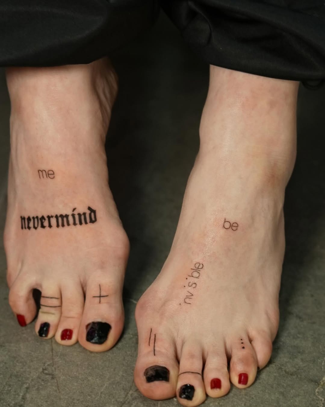 Artistic foot tattoos with bold lettering Tattoo Design