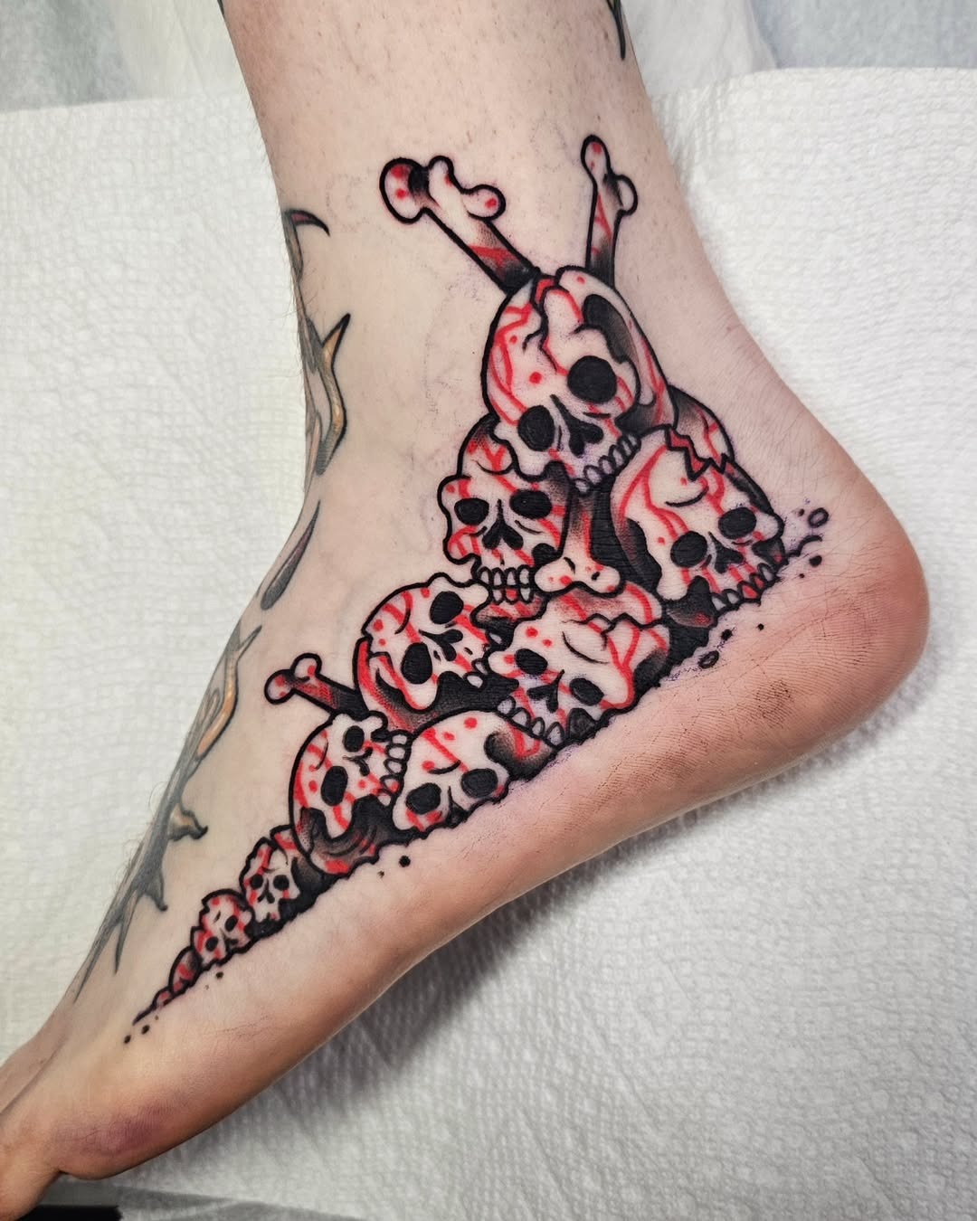 Bold skeleton design on the foot Tattoo Design