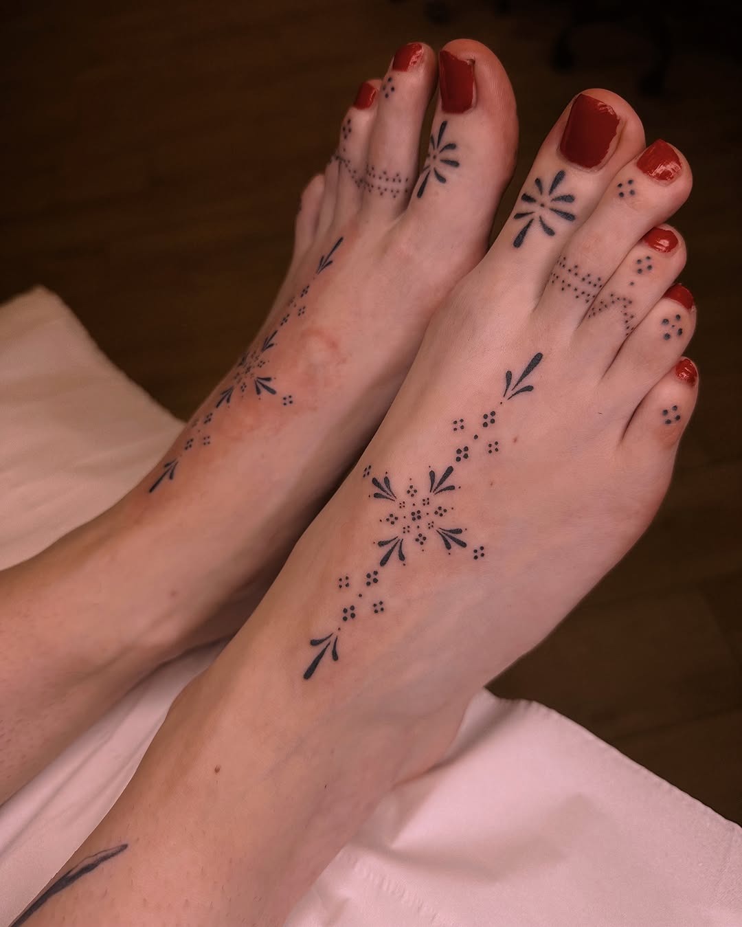 Delicate floral foot tattoo design inspiration Tattoo Design