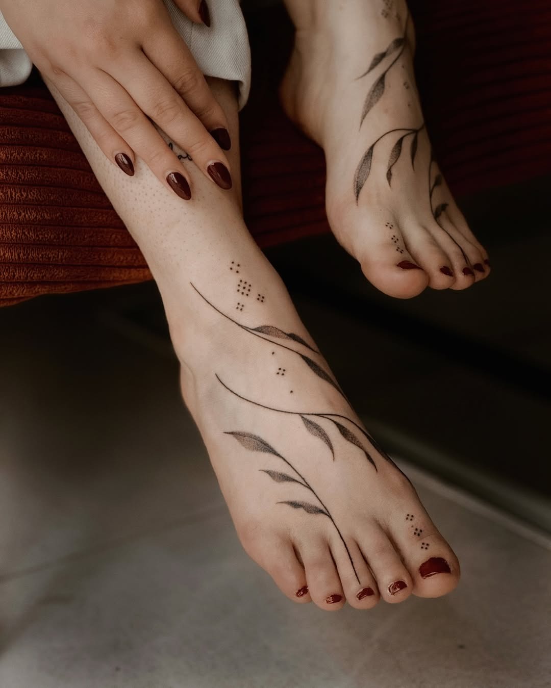 Elegant foot tattoos with leafy designs Tattoo Design