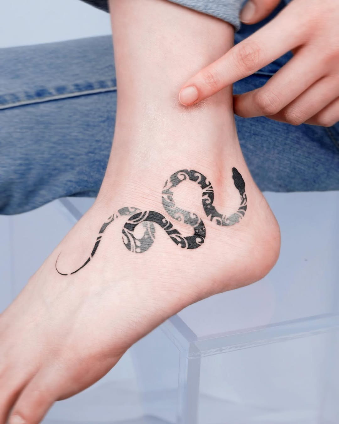 Elegant snake design wrapping around the ankle Tattoo Design