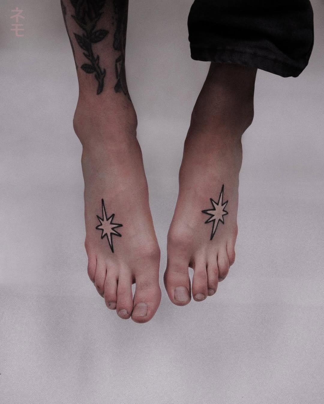 Minimalist Star Tattoos on Bare Feet Tattoo Design