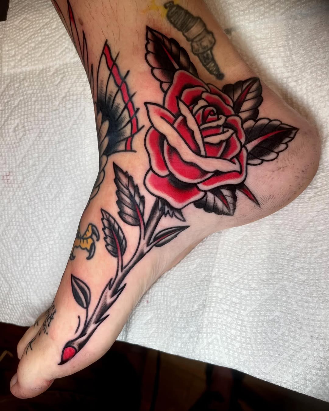 Vibrant Rose Tattoo on the Foot Tattoo Design