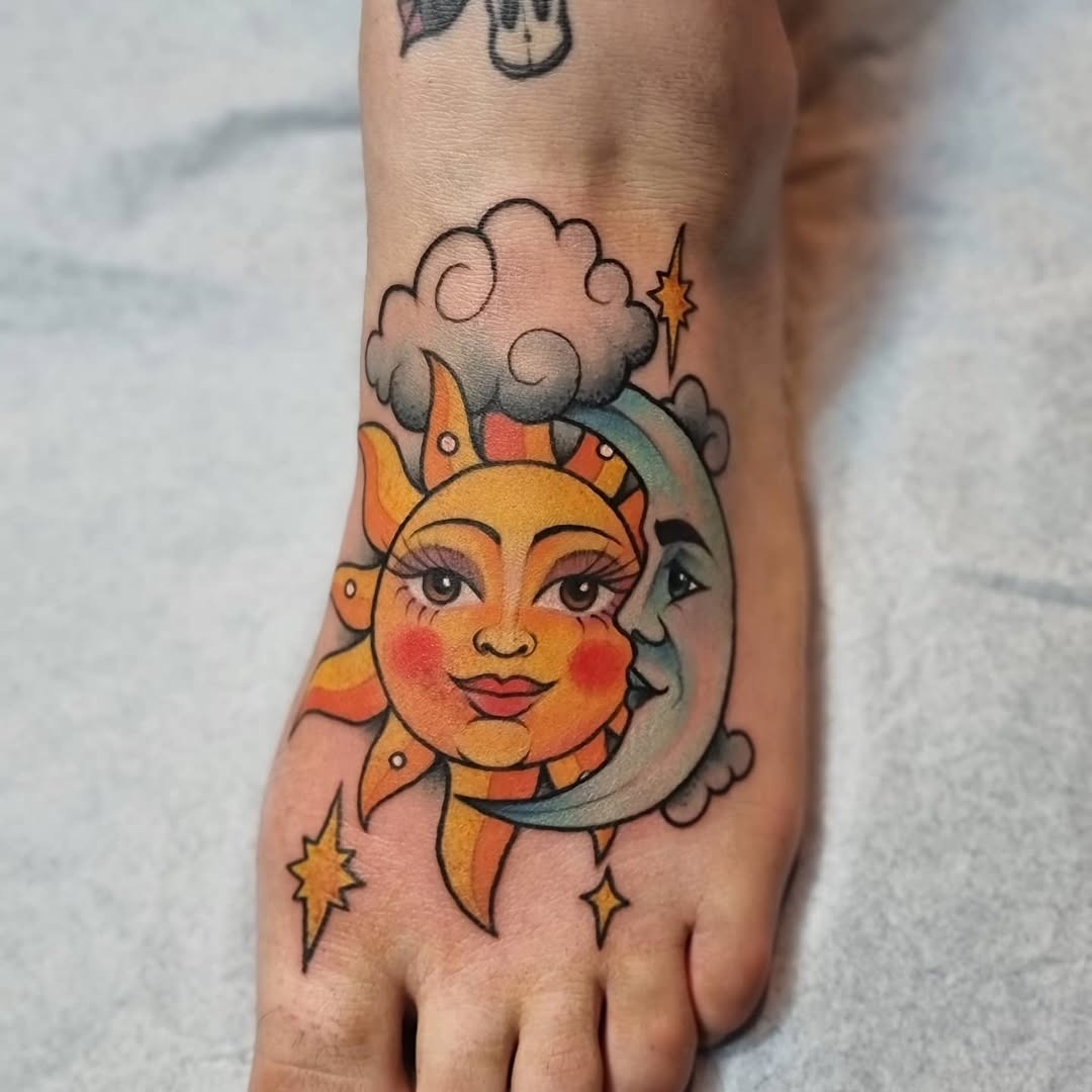 Vibrant sun and moon foot tattoo Tattoo Design