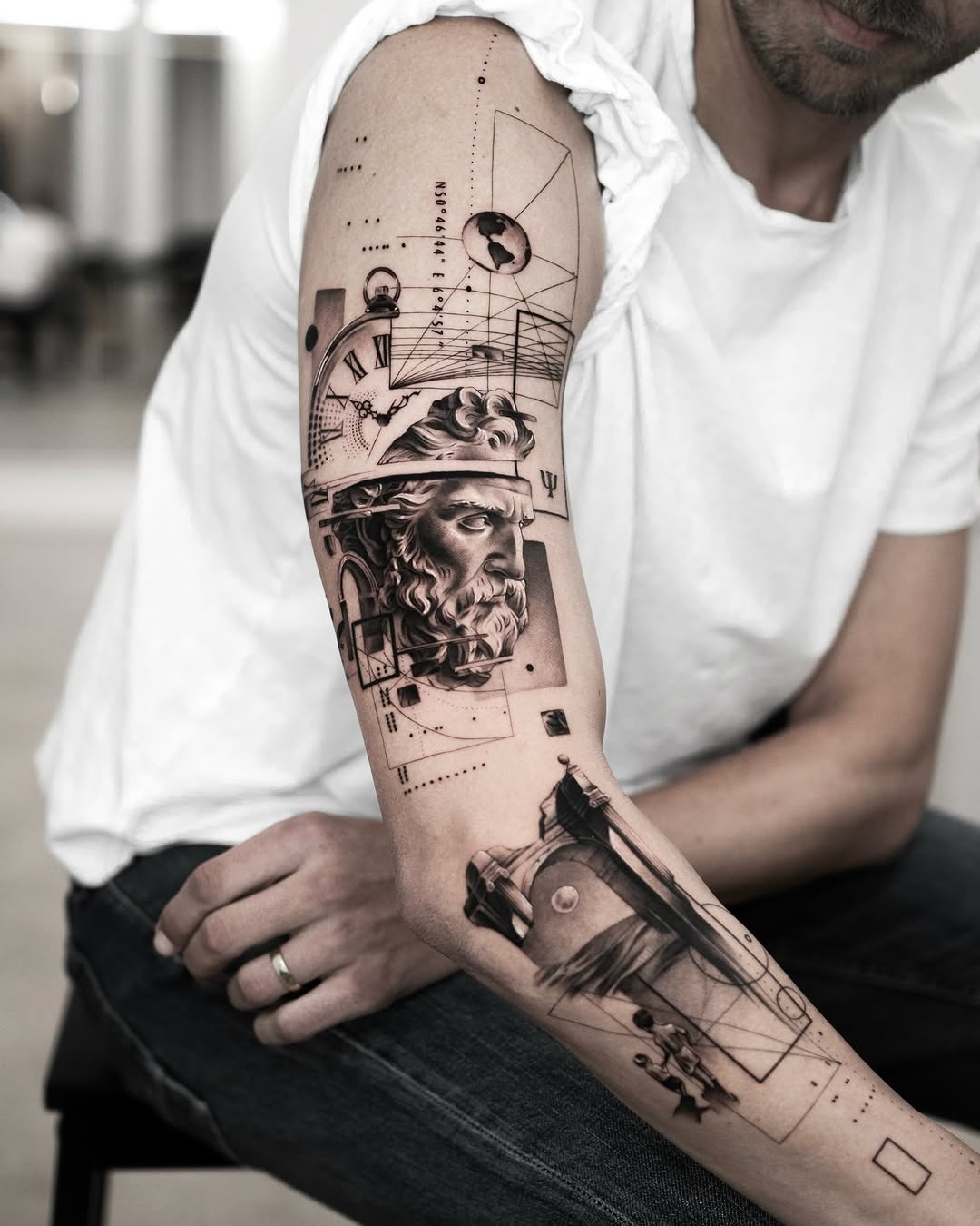 Artistic forearm tattoo blending nature and identity tattoo design