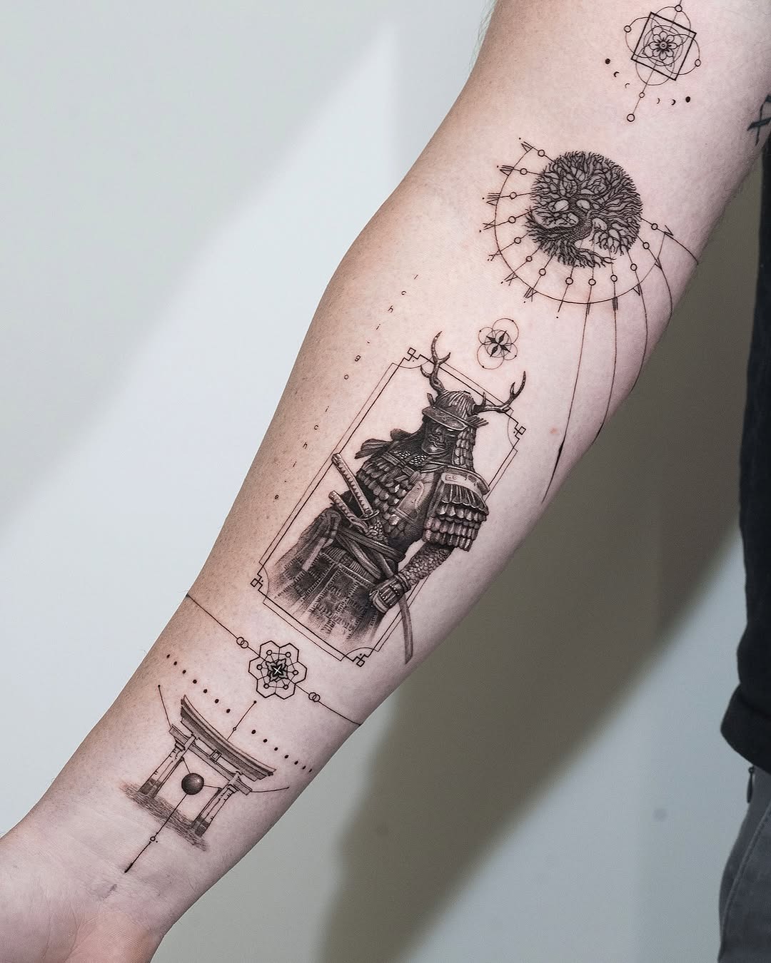 This forearm tattoo showcases a detailed samurai knight, embodying strength and honor.