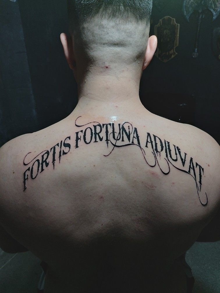 Backpiece with Elegant Script Tattoo Design
