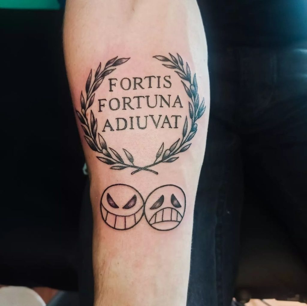 Laurel Wreath and Masks Design Tattoo Design