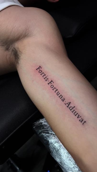 Simple Inner Forearm Typeface Tattoo Design