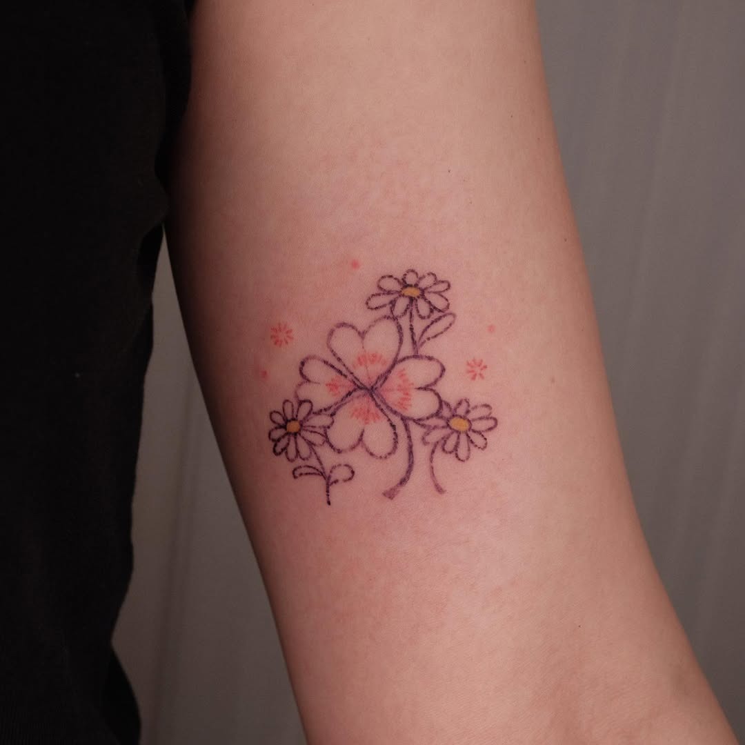 Charming four leaf clover floral tattoo details Tattoo Design