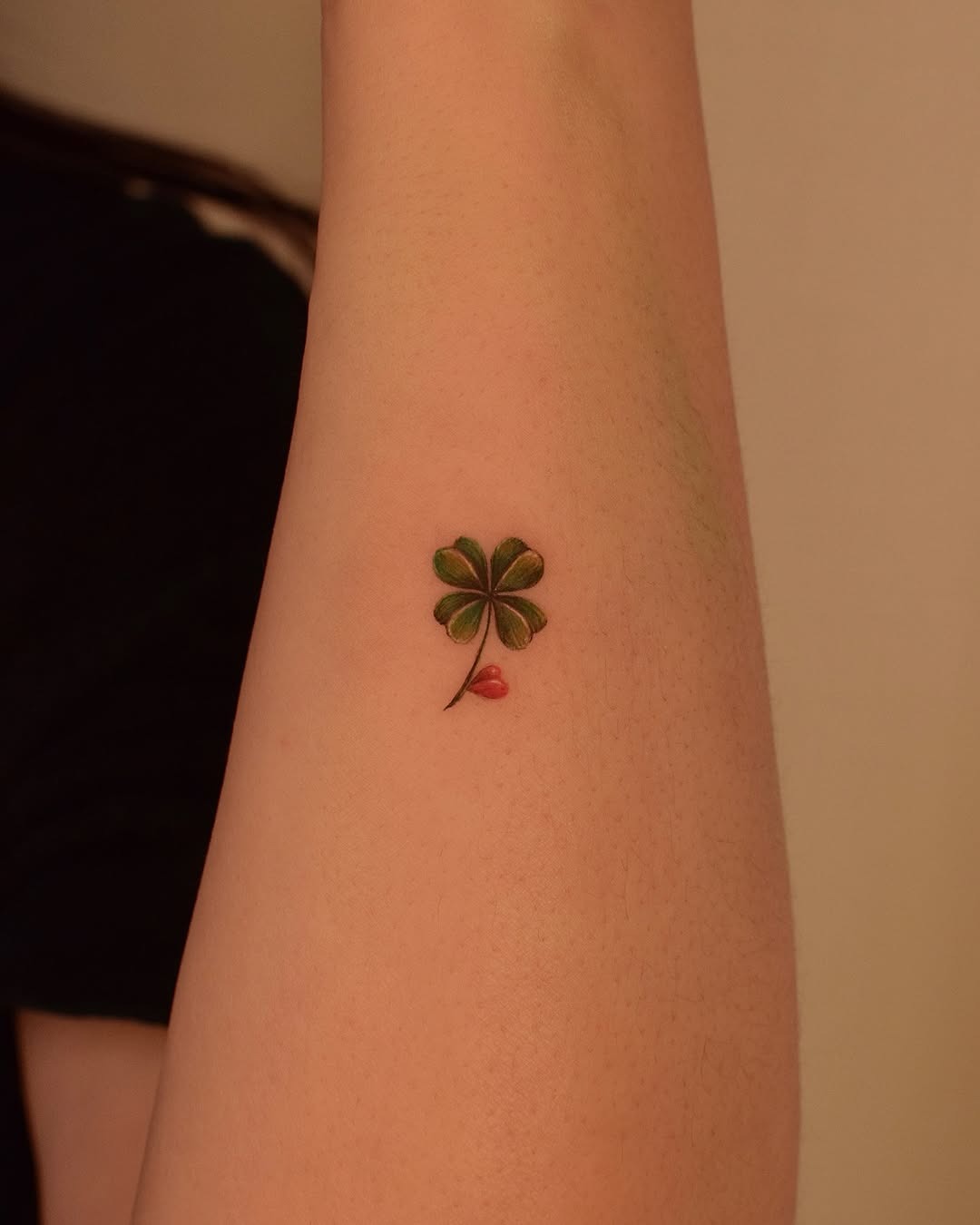 Charming four leaf clover tattoo design on arm Tattoo Design