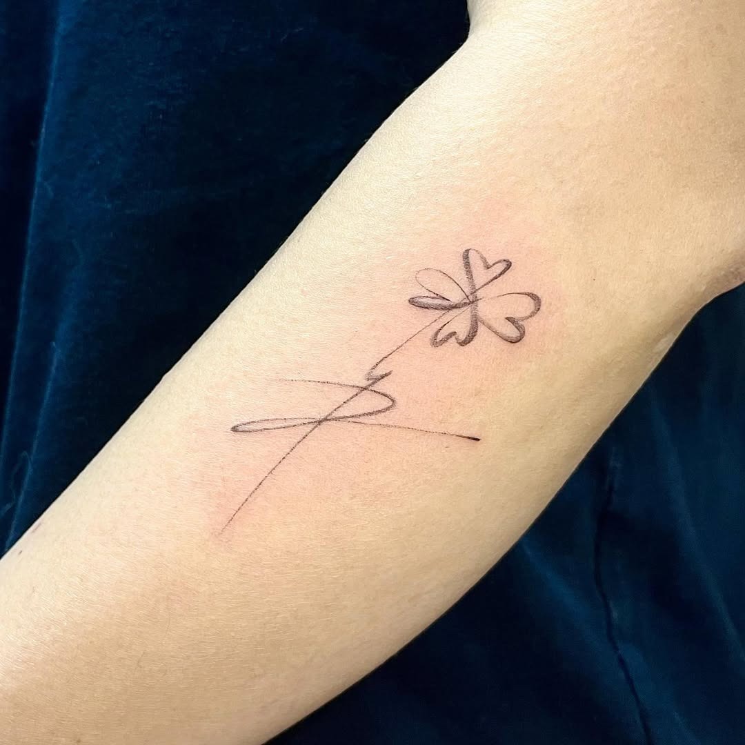 Charming minimalist four-leaf clover tattoo Tattoo Design