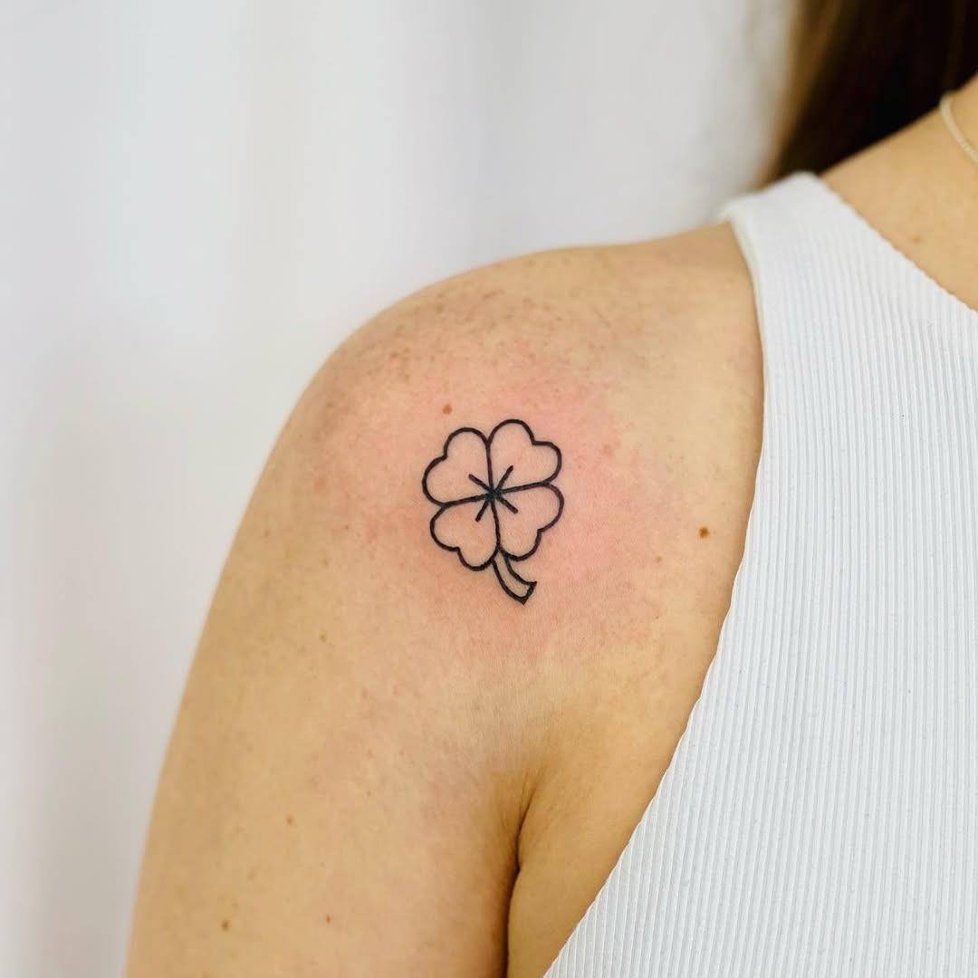 Charming minimalist four-leaf clover tattoo Tattoo Design