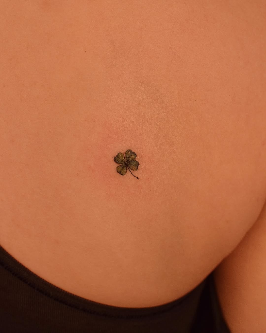 Charming small four leaf clover tattoo design Tattoo Design