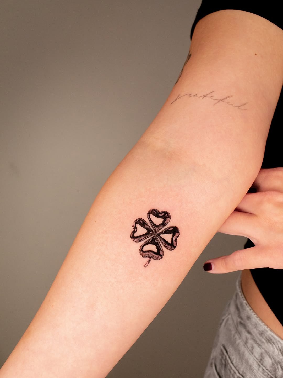 Elegant design showcasing a four-leaf clover tattoo Tattoo Design