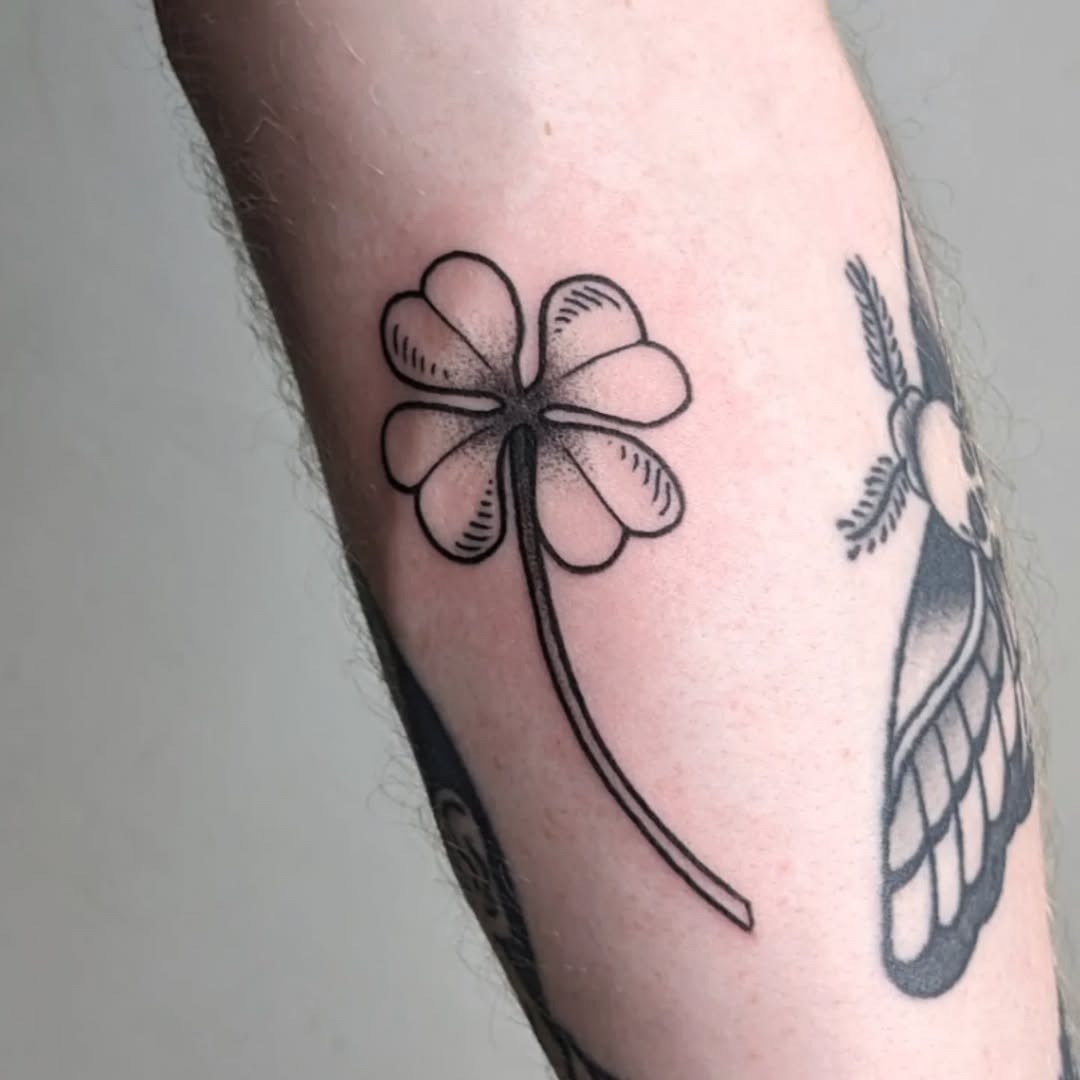 Minimalist four-leaf clover tattoo design Tattoo Design