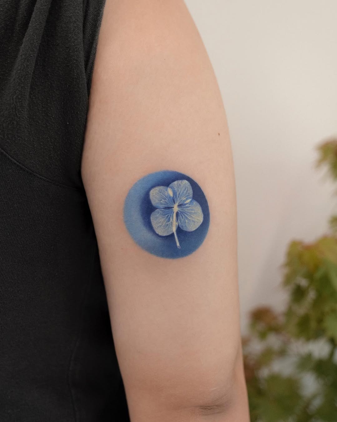 Stunning blue four-leaf clover tattoo design Tattoo Design