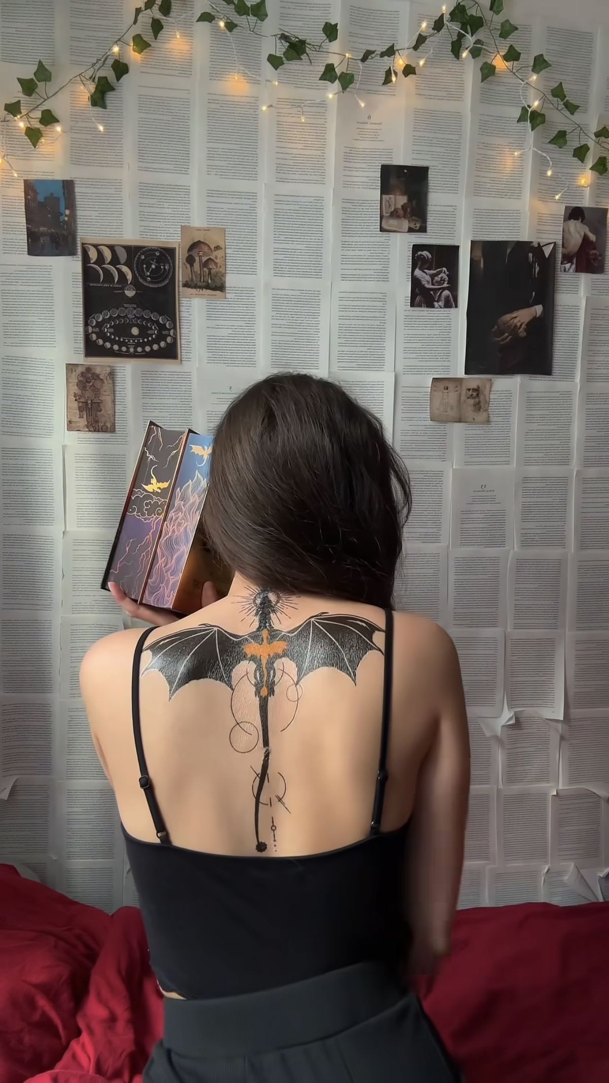 Dramatic Back Dragon with Bookish Fantasy Energy Tattoo Design