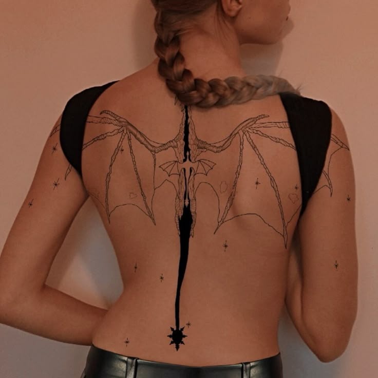Fine Outline Dragon Wings Across the Back Tattoo Design