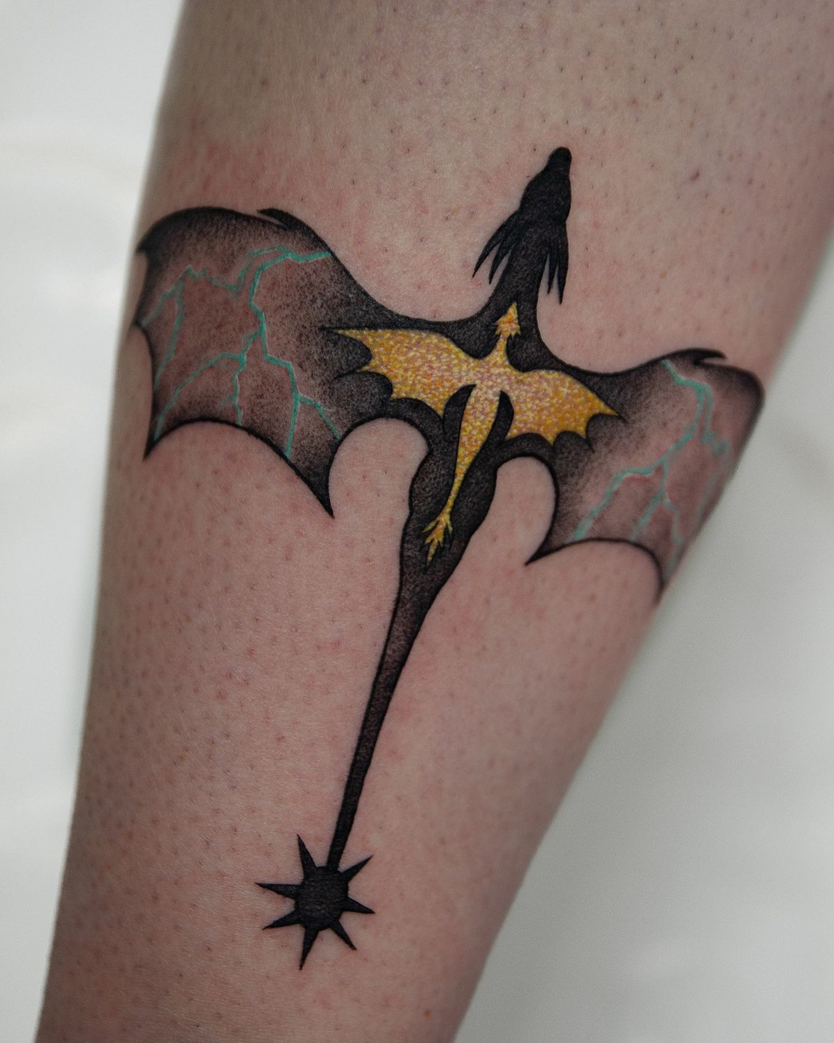Golden Dragon Silhouette with Lightning Details Tattoo Design