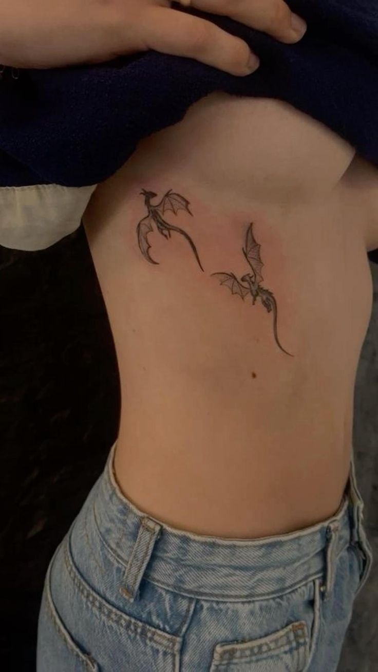 Tiny Side Dragons with Delicate Movement Tattoo Design