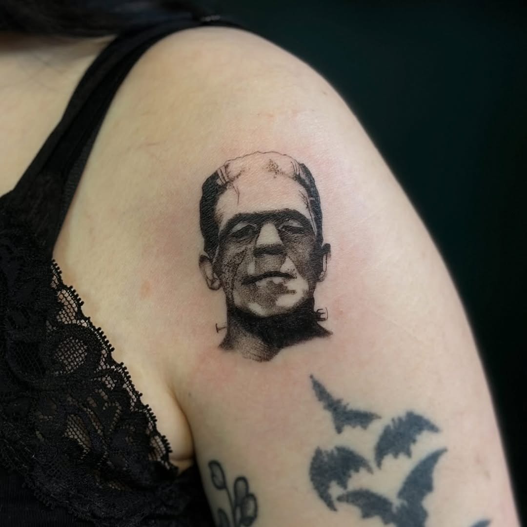 Intricate black and gray Frankenstein tattoo design Tattoo Design