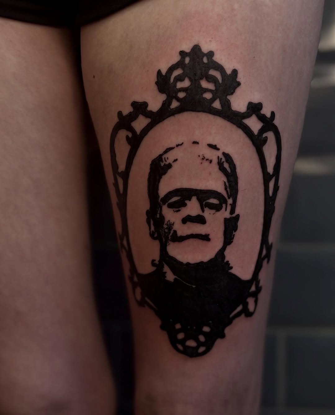Striking portrait of Frankenstein in vintage frame. Tattoo Design