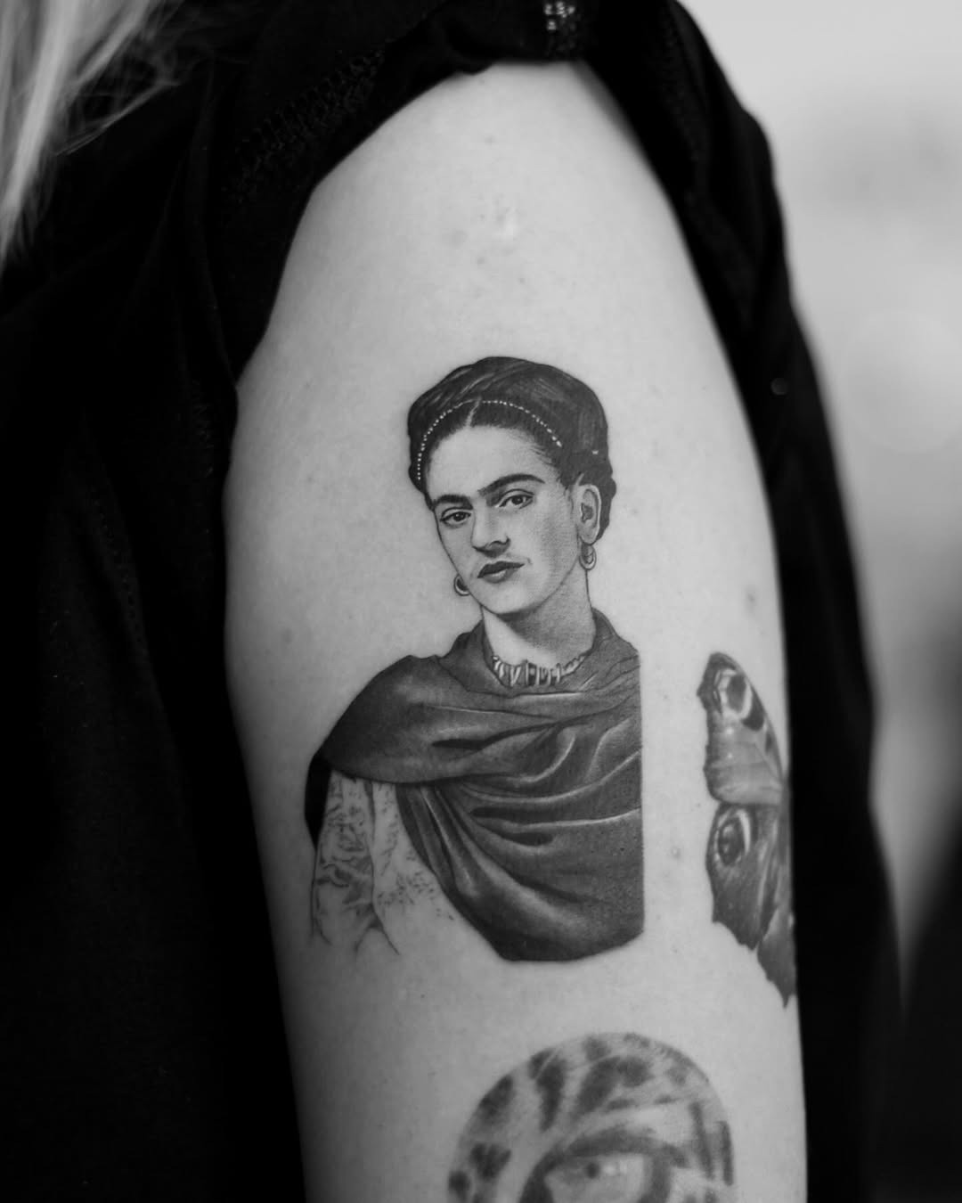 A striking Frida Kahlo tattoo in monochrome Tattoo Design