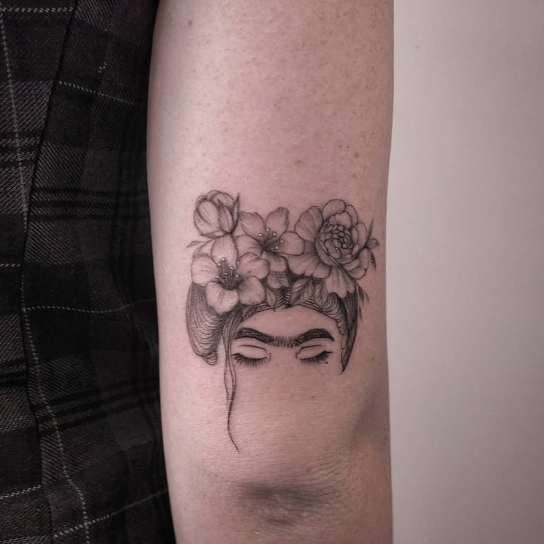 Elegant floral crown tattoo inspired by Frida Tattoo Design