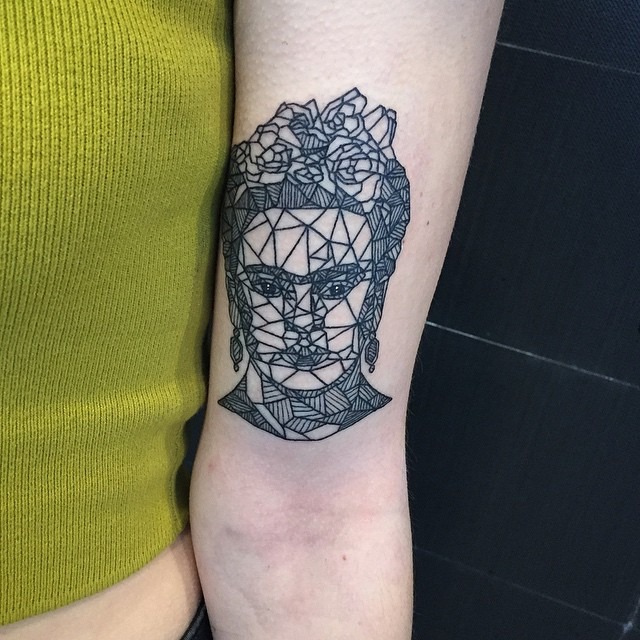 Geometric Frida Kahlo tattoo with floral accents Tattoo Design