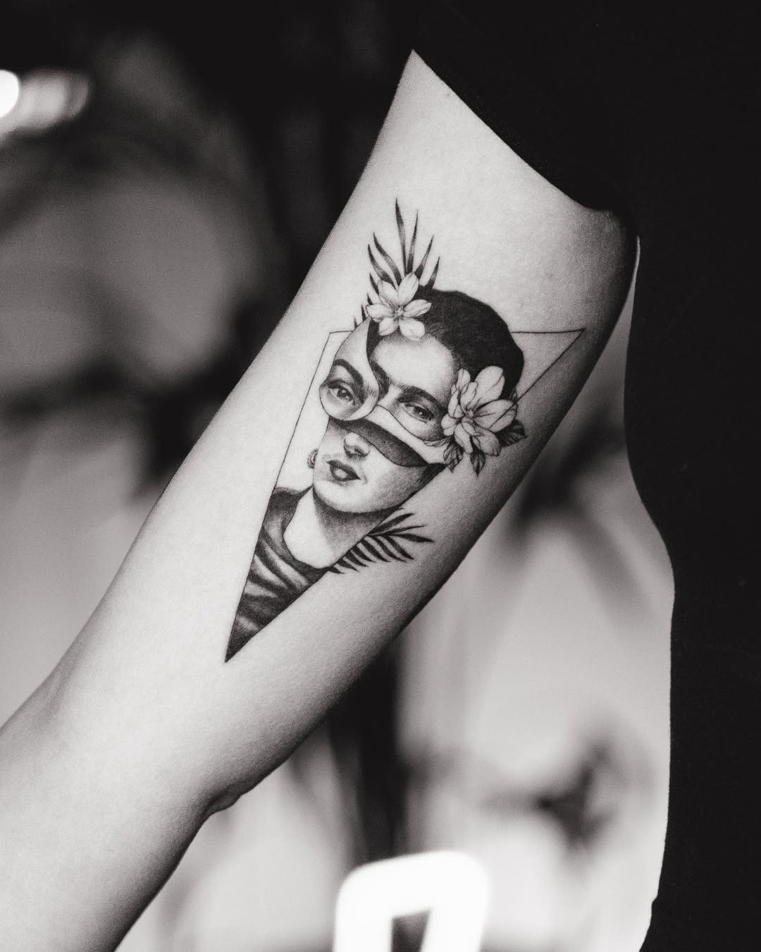 Intricate Frida Kahlo Tattoo with Floral Elements Tattoo Design